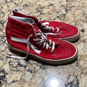 Red Vans High Tops men’s size 10.5 women’s size 12. Clean minimal wear